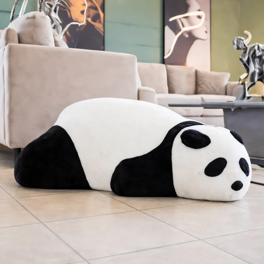Panda cushion in modern living room.webp