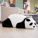 Panda cushion in modern living room.webp