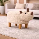 Cute rhino footstool in cozy living room.webp