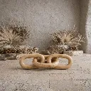 Serene desert-inspired wooden link still life.webp