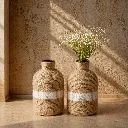 Sunlit serenity with rustic vases.webp