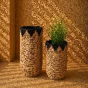 Sunlit woven planters and shadows.webp