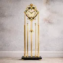 Elegant gold-plated grandfather clock.webp