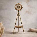 Antique tripod clock with brass details.webp