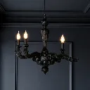 Elegant antique chandelier in dark room.webp