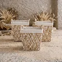Rustic woven baskets with natural textures.webp