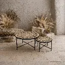 Minimalist patio with mosaic tables.webp