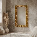 Golden mirror with pampas accents.webp