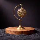 Ornate brass filigree ornament close-up 2 copy.webp