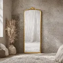 Serene minimalist interior with ornate mirror.webp