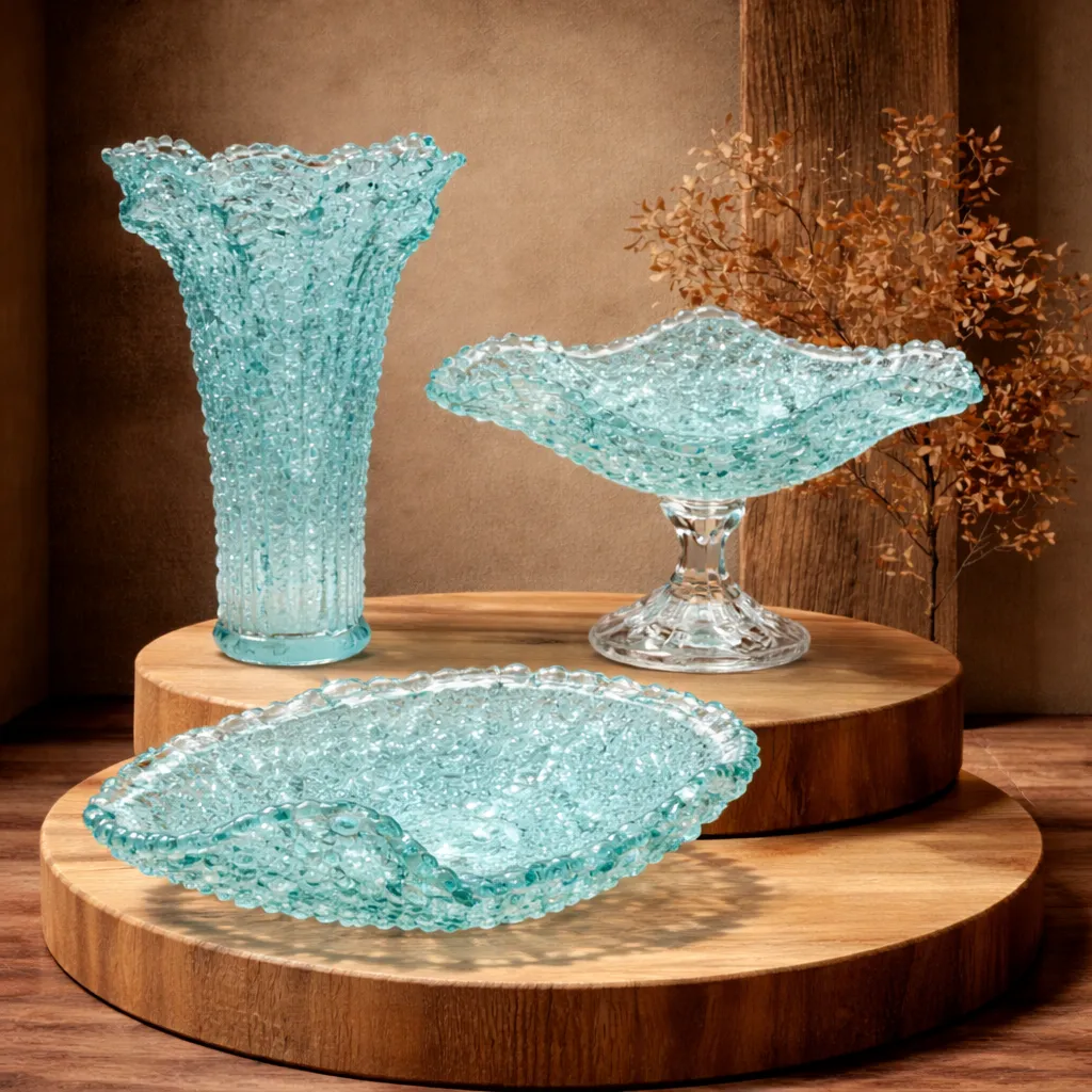 Vintage aqua glassware display.webp