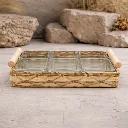 Woven tray with glass containers.webp