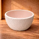 Decorative matte white ceramic bowl.webp