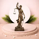 Lady Justice in bronze detail.webp