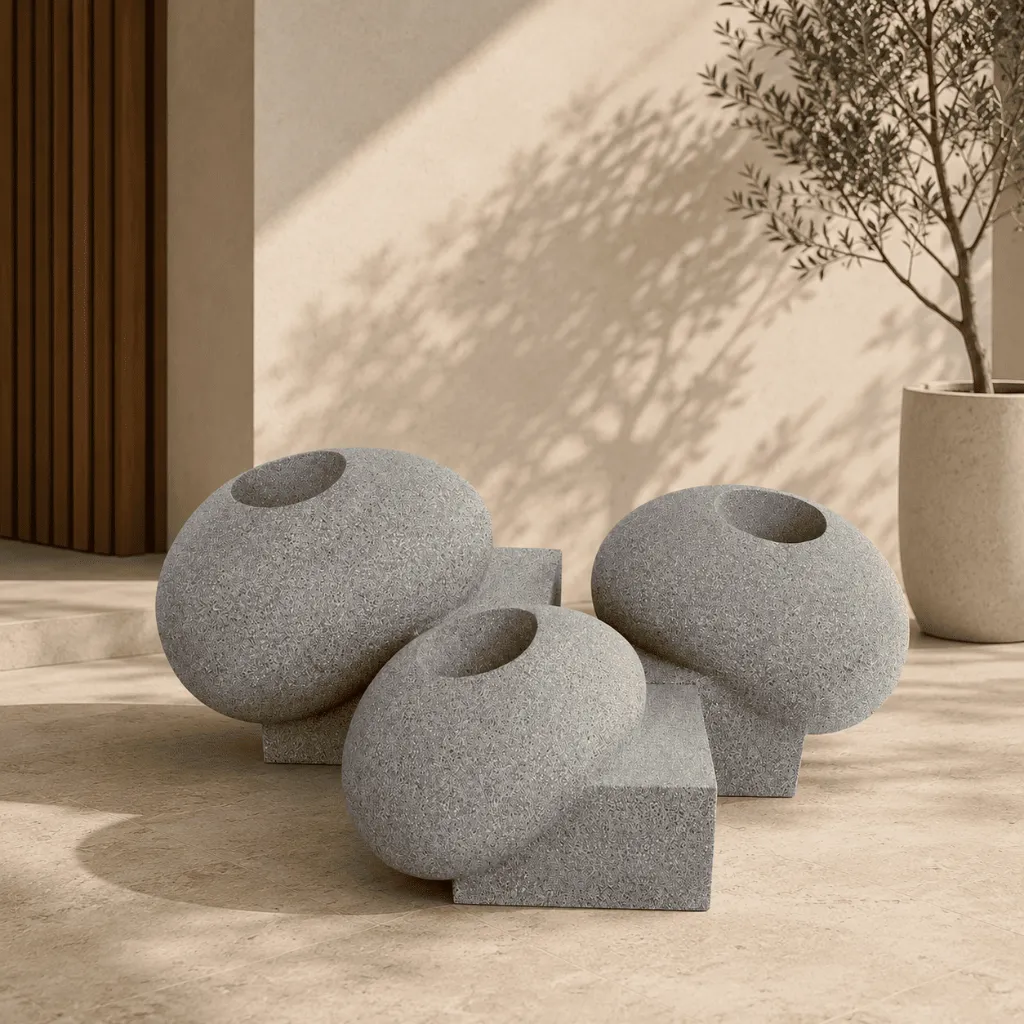 grey stone pebble-shaped planters.webp
