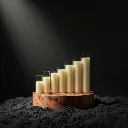 Elegant row of flickering candles.webp